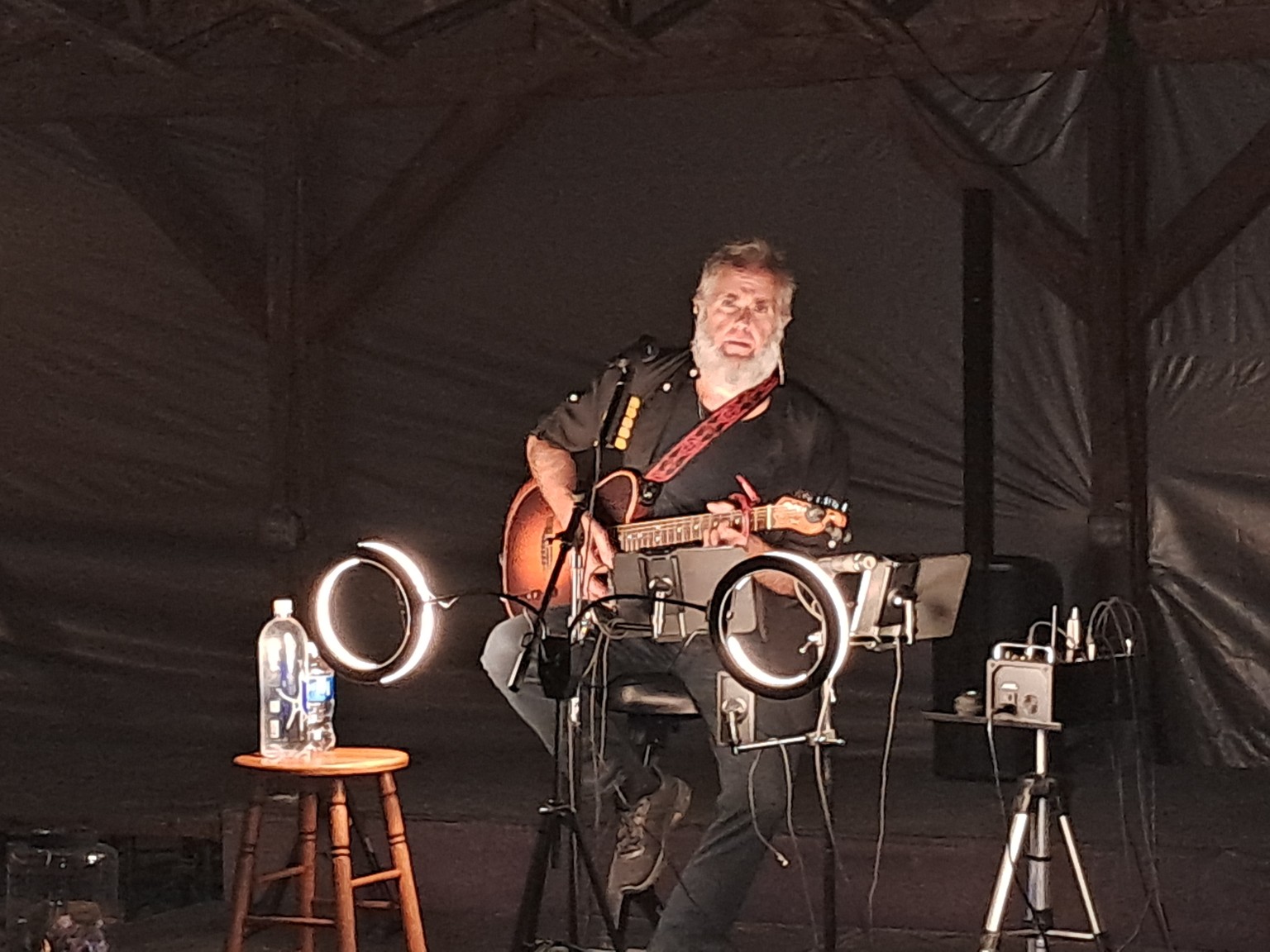 Trevor Knowles on a dark stage